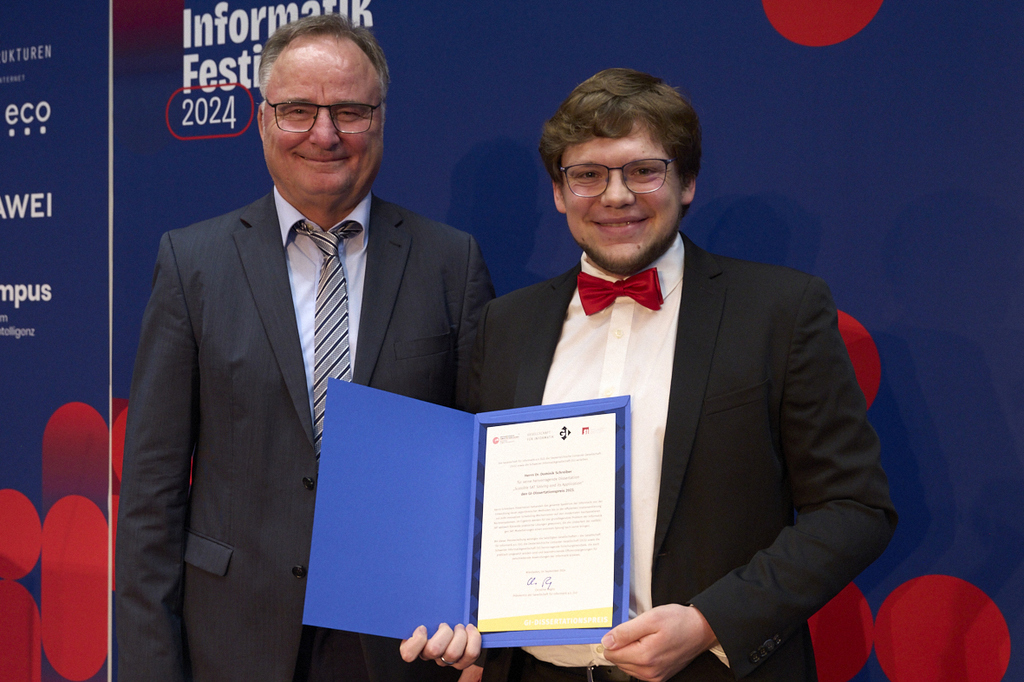 Dominik Schreiber bei der Verleihung des Disserationspreises der GI